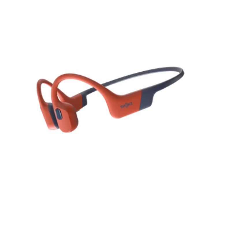 Orange and black Shokz OpenSwim Pro wireless earbuds on a white background